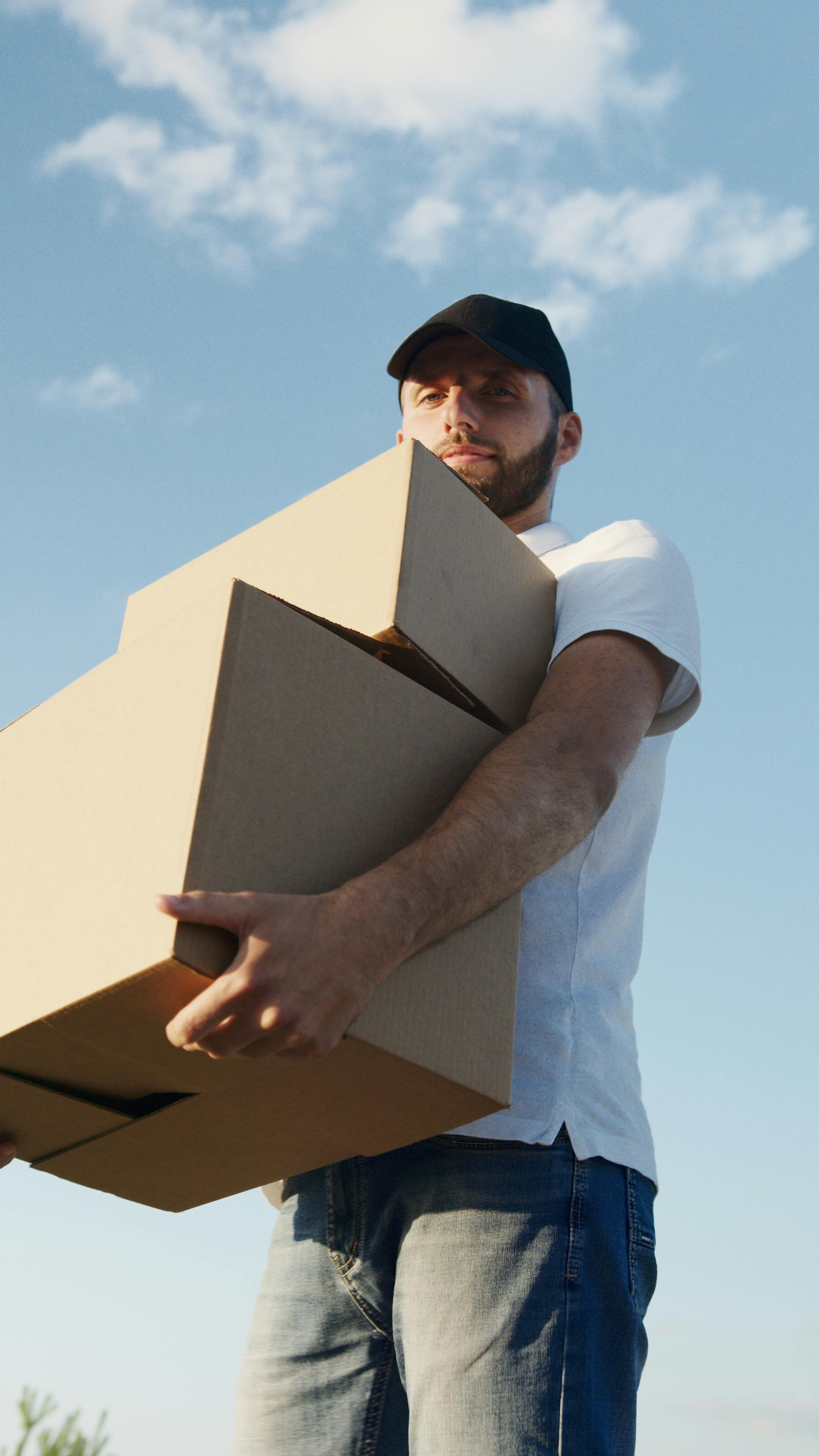 Professional mover in Maui carefully handling boxes with aloha spirit